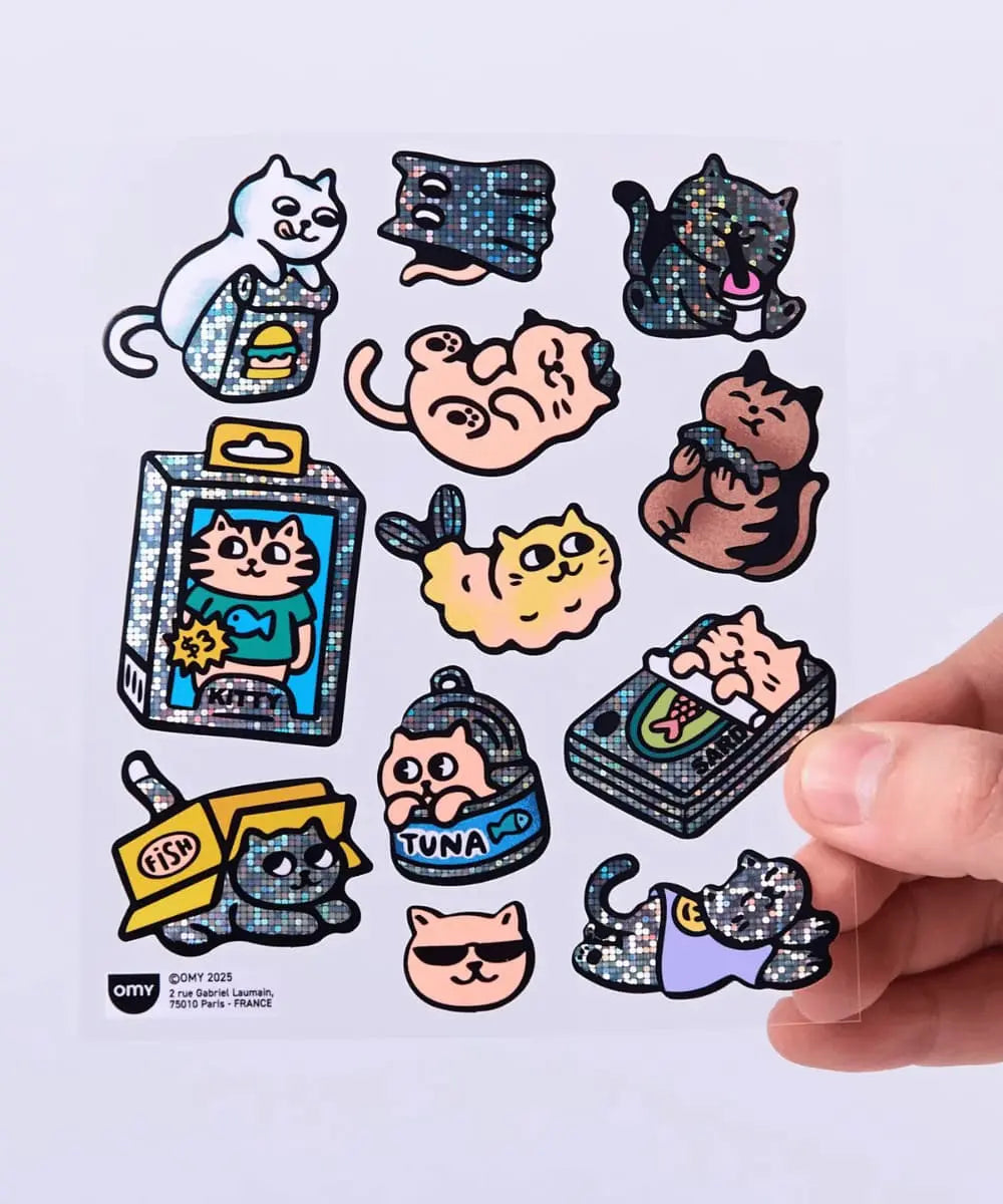 Détail des finitions fluorescentes et brillantes des stickers chats OMY.