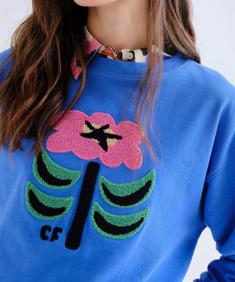 Sweat bleu à patch fleurs Neo Garden de Compañía Fantástica