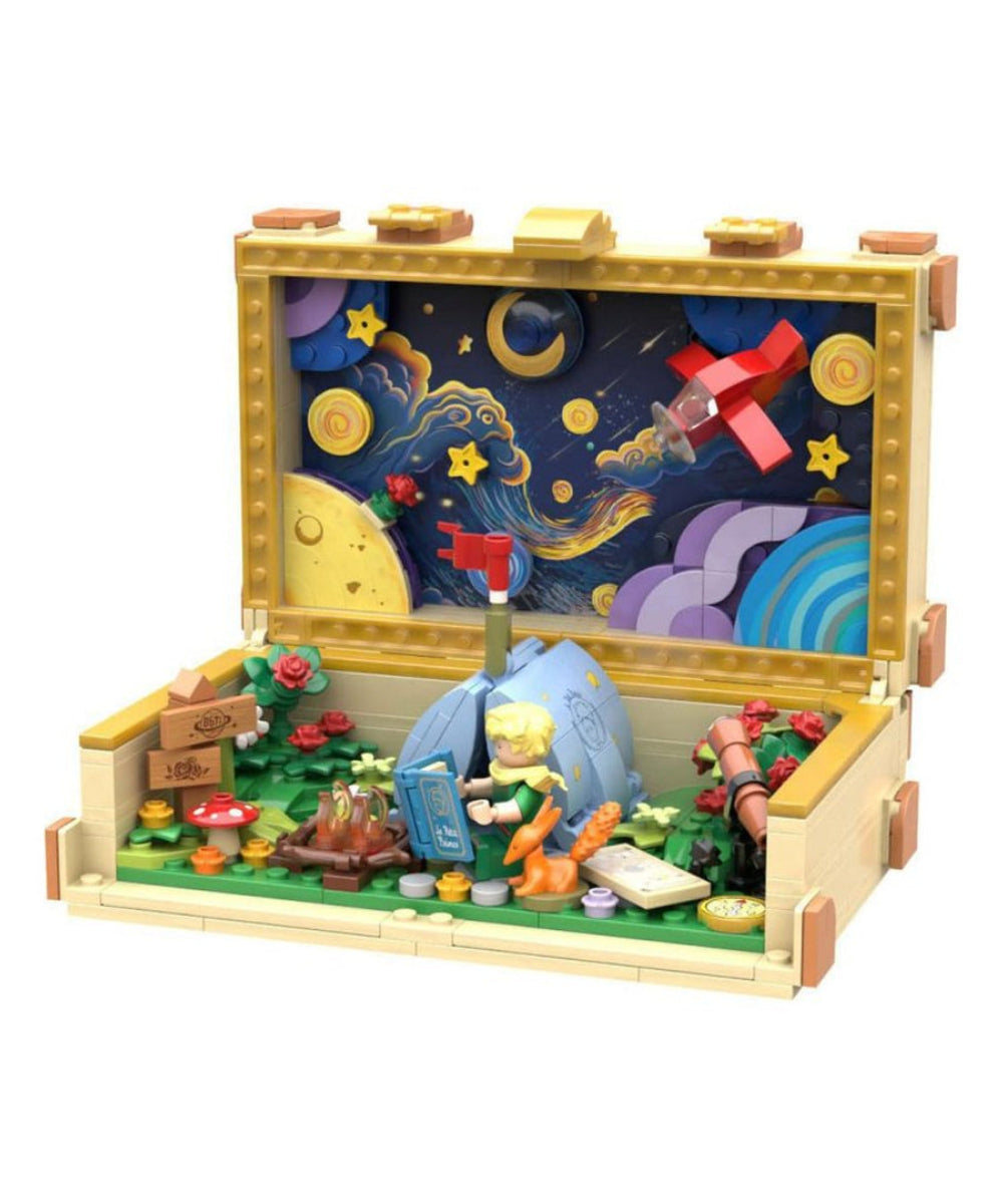 Valise Le Petit Prince à construire ouverte sur fond blanc