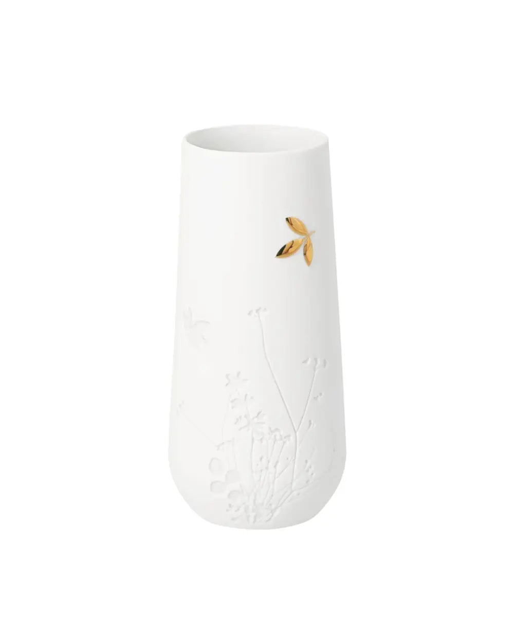 Petite vase en porcelaine blanche mate de rader avec motif feuille doree.
